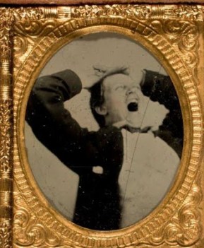 portrait of yoiung man yawning